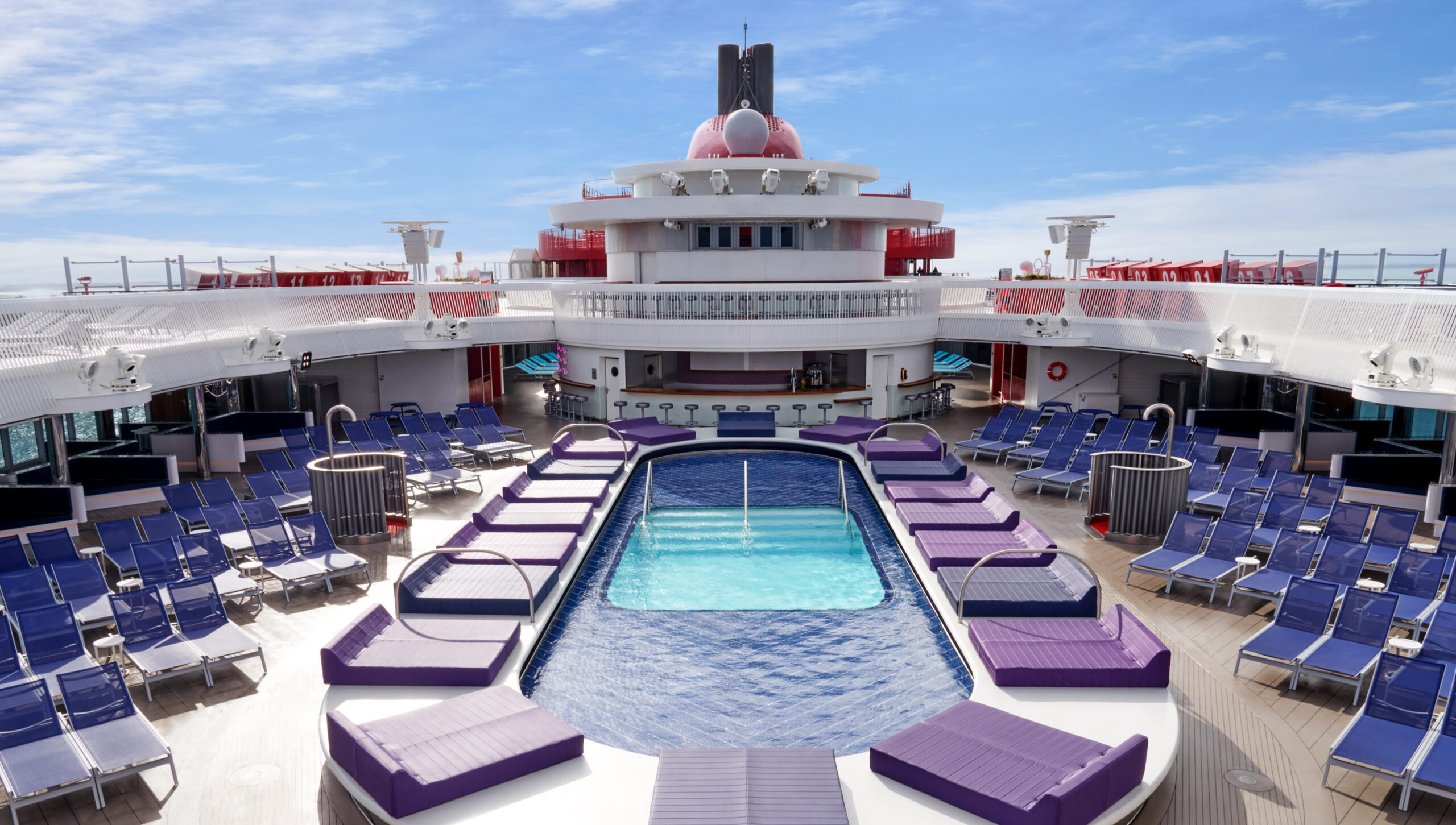 Poolside on the Scarlet Lady